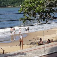 Vizinho fotografa povo curtindo a praia