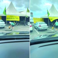 Manifestantes jogam óleo da cozinha do acampamento no bueiro