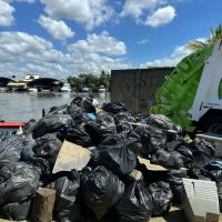 Duas toneladas de lixo tiradas do rio Camboriú