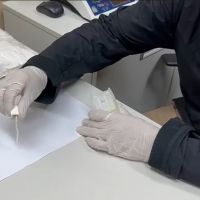 Mulher tenta embarcar para a França com cocaína amarrada ao corpo