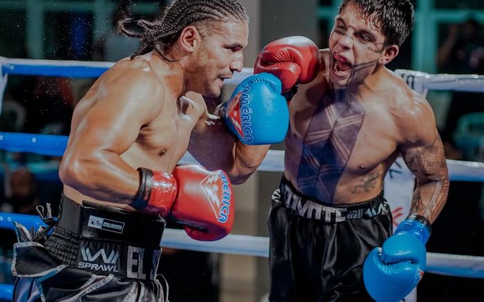 Erenilson “El Santos” (à esquerda) venceu por pontos após seis rounds (Foto: Divulgação)